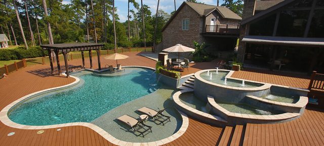 Natural swimming pool with water feature - Master Pools Guild