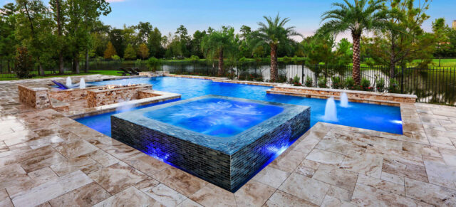 Water pool with water feature - Master Pools Guild